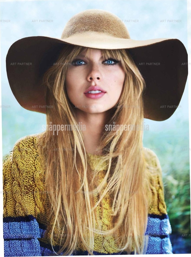 http://www.taylorpictures.net/albums/photoshoots/2012/vogue/008.jpg