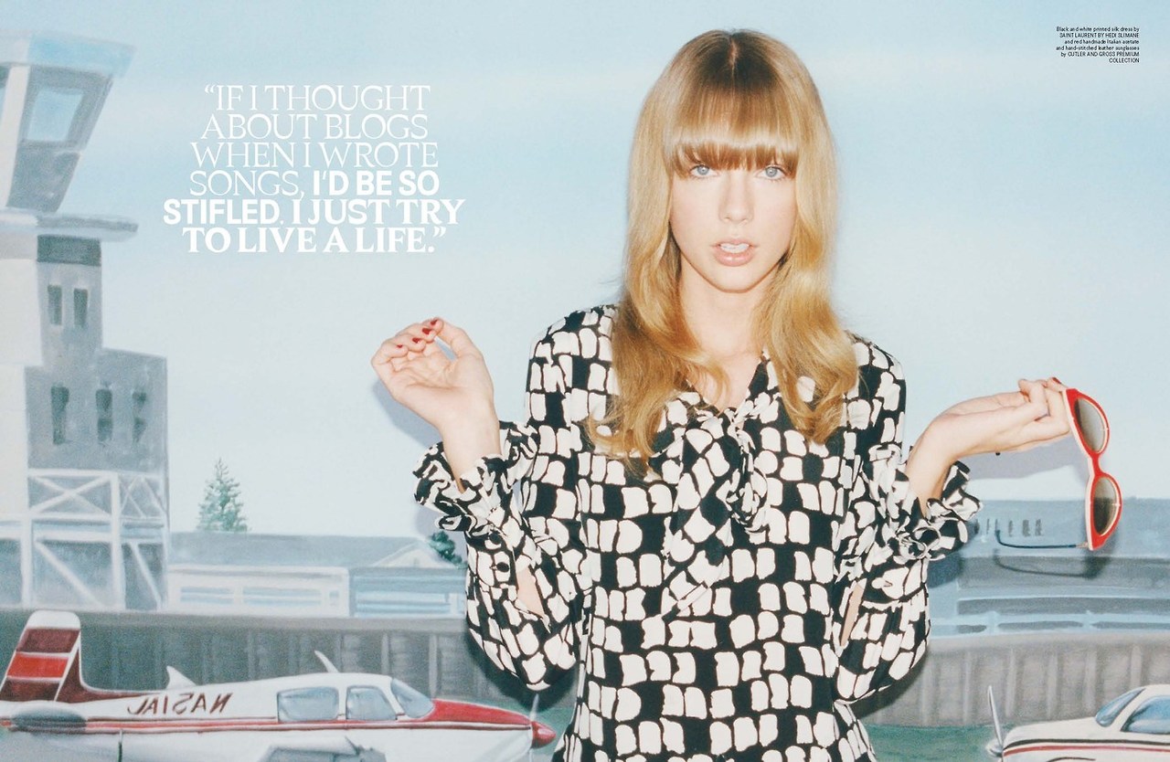 http://www.taylorpictures.net/albums/scans/2013/wonderland/008.jpg