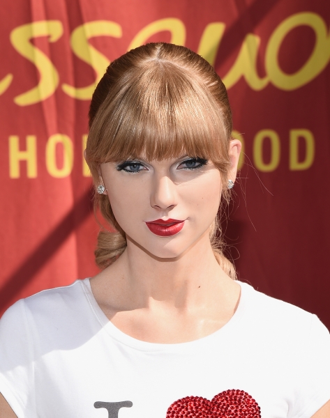 The wax figure of singer Taylor Swift is unveiled at Madame Tussauds Hollywood on October 27, 2014 in Hollywood, California.
